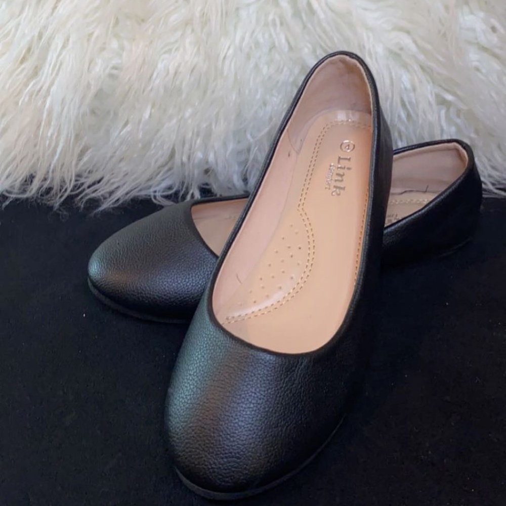 Kids black slip on closed in shoe